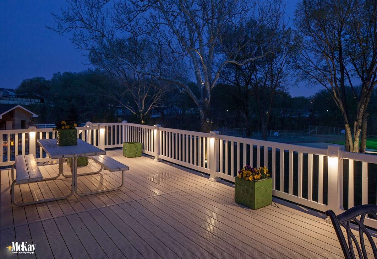 Deck Post Lighting: Adding light to the posts of your deck can easily extend your time outside while adding safety... Click to see more deck lighting ideas... | McKay Landscape Lighting Omaha Nebraska - Deck & Patio Lighting Ideas 